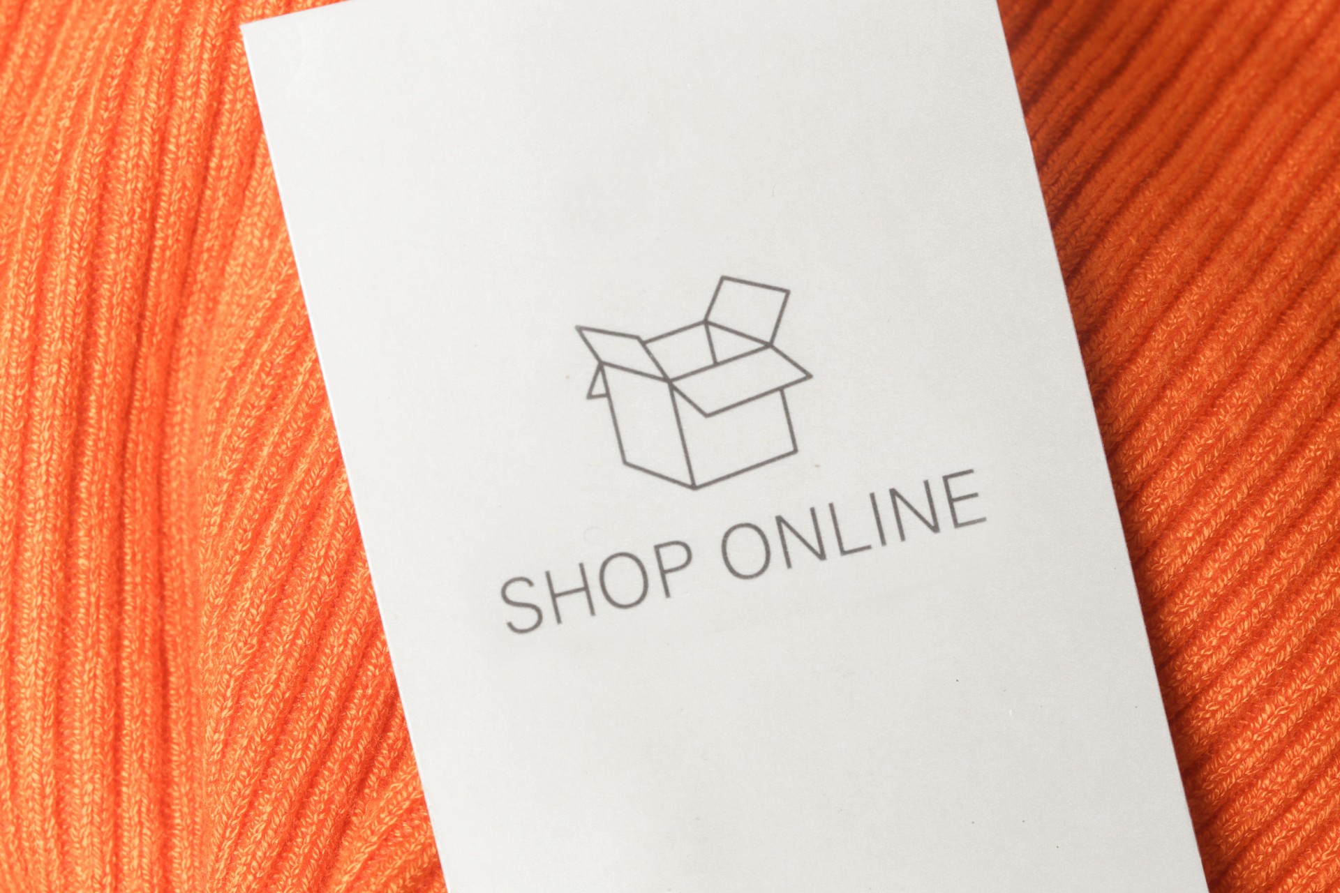 Shop online, written on the clothing tag